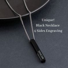 🖤Black Mens Necklace - The best gift for Him - Get a Vertical 3D Bar Engageable  Pendant for Dad with his kid's names on each 1-4 sides of the bar - Makes him the proudest daddy! * Laser Engraved necklace, features a black 3D bar pendant with a black curb chain made from high-quality stainless steel.  * You can choose 1-4 sides of any custom engraving: names, dates, coordinates, and more.  * This is a unique, customized Family gift for that remarkable man in your life!  ♥ S I Z E  &  M A T E R I A LS: ★ STYLE: Black 3D Bar Necklace ★ MATERIALS: Premium Stainless Steel ★ PENDANT SIZE: 40mm x 5mm ★ CHAIN STYLE: 3mm Black Chain ★ CHAIN LENGTH OPTIONS: Chain: 60cm / 23.6" ♥ H O W     T O     O R D E R: Please write your personalized engraving when placing your order.  ♥ G I F T I N G: All my Engraved Black Necklaces For Anniversary, Black Engraved Necklaces For Anniversary, Black Sterling Silver Jewelry For Father's Day, Black Stainless Steel Jewelry With Engraving Option, Black Sterling Silver Jewelry With Engraving Option, Minimalist Black Jewelry With Engraving Option, Modern Necklace For Father's Day Gift, Custom Name Black Necklace For Gift, Personalized Black Necklace For Birthday Gift