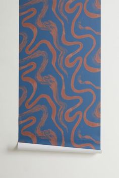 an orange and blue wallpaper with wavy lines in the middle, against a white background