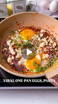 an egg being cooked in a skillet on the stove with words virtual one - pan eggs, part 1