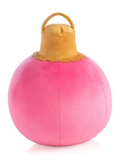 a large pink ball with a wooden handle on the top and a yellow hat on top