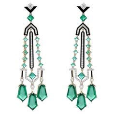 These exquisite earrings are handcrafted in 14-karat gold, 27.16 carats emerald and set in 1.42 carats of sparkling diamonds. FOLLOW MEGHNA JEWELS storefront to view the latest collection & exclusive pieces. Meghna Jewels is proudly rated as a Top Seller on 1stDibs with 5 star customer reviews. All items manufactured by us are handmade and can be customized or redesigned. Certificate available upon request. Composition Gross Weight : 20.930 Gms. Gold Net Weight : 15.053 Gms. Emerald Weight: 27.1 Green Diamond Earrings For Evening, Art Deco Emerald Gemstone Jewelry, Luxury Dangle Emerald Jewelry, Luxury Green Hand-set Earrings, Luxury Green Diamond Earrings, Luxury Green Diamond Earrings With Accents, Luxury Emerald Earrings In Exquisite Style, Luxury Emerald Drop Earrings, Luxury Green Emerald Diamond Earrings