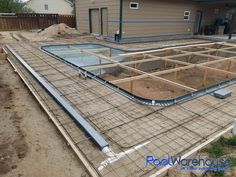 a house under construction with the foundation in place