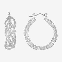 Monet Jewelry's chic twist hoop earrings have a sophisticated design with a textured finish that gives unique look to classic hoops. They are made from hypoallergenic metal with a polished finish and clasp closure.Features: HypoallergenicEarring Back: PostMetal Color: Silver ToneEarring Length: 32.2mmEarring Width: 31.7mmEarrings Style: Hoop EarringsCountry of Origin: Imported Modern Twist Small Hoop Metal Earrings, Modern Twist Hoop Earrings In Metal, Modern Textured Small Hoop Earrings, Elegant Twisted Metal Hoop Earrings, Modern Textured Round Earrings, Modern Textured Hoop Jewelry, Modern Textured Small Hoop Jewelry, Twist Hoop Earrings, Monet Jewelry