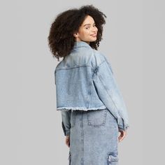 Cropped Denim Trucker Jacket from Wild Fable™. Crafted from heavyweight, 100% recycled cotton fabric. Tailored in a cropped silhouette with mid length. Features classic stitched-seam details with a collared neckline, a button-front design and long sleeves with buttoned cuffs. Two flap chest pockets with button closures complete the look. If you're not satisfied with any Target Owned Brand item, return it within one year with a receipt for an exchange or a refund. Wild Fable™: A look for every st Spring Cropped Denim Vest With Pockets, Cotton Cropped Jacket For Fall, Cropped Cotton Jacket For Fall, Denim Cropped Jacket With Pockets, Streetwear Cropped Jacket With Pockets, Cropped Streetwear Jacket With Pockets, Spring Denim Blue Cropped Cotton Jacket, Medium Wash Cropped Denim Vest With Pockets, Cropped Denim Vest With Pockets In Medium Wash