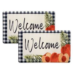 two welcome signs with fruit on them