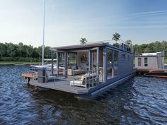 a houseboat floating on top of a body of water