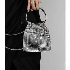 This splendid design is fun and versatile. A fun style that will transform your outfits into stylish ensembles. Small Top Handle Bag, Crystal Handbag, Melie Bianco, Crystal Top, Rhinestone Clutch, Crystal Clutch, Drawstring Bucket Bag, Eve Outfit, Statement Accessories