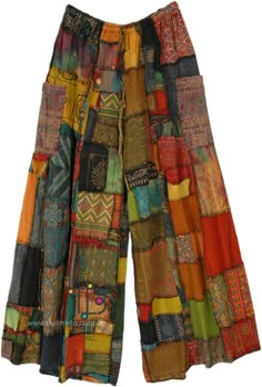 Revel in pure hippie bohemian aesthetic in these handmade plus size patchwork wide leg pants! Made with soft and breathable organic cotton, these pants feature an orange overdye color scheme with unique patchwork designs that are sure to turn heads.  The wide legs offer a flowy and comfortable fit, perfect for bohemian and hippie-inspired styles. #tlb #SplitSkirtsPants #Patchwork #XLPlus #HippiePants Bohemian Wide Leg Bottoms With Patchwork, Orange Bohemian Cotton Bottoms, Bohemian Orange Cotton Bottoms, Orange Cotton Patchwork Bottoms, Orange Bohemian Cotton Pants, Bohemian Orange Cotton Pants, Orange Bohemian Wide-leg Pants, Bohemian Orange Wide-leg Pants, Orange Clothing