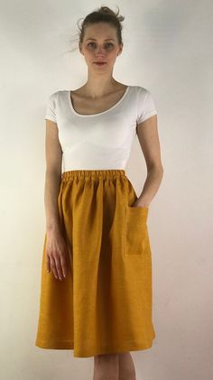 "Write the selected color in the message Handmade mustard linen midi skirt with зatch pockets on the sides, elastic waistband, perfect for casual wear and suitable for any occasion in any season Details: - 100% natural linen produced in Europe ; - medium weight (180 gram per square meter); - color: mustard, could be any from our colors catalog (color samples at the photo); Made to order, approximately a few days, If you have any questions please message me and I will be glad to answer. Size guid Summer Linen Skirt With Side Pockets, Summer Cotton Skirt With Pockets, Cotton Orange Skirt For Day Out, Orange Cotton Skirt For Day Out, Everyday Summer Skirt With Elastic Waistband, Everyday Summer Skirt With Pockets, Orange Summer Skirt With Pockets, Summer Midi Bottoms With Side Pockets, Solid Color Summer Skirt With Side Pockets