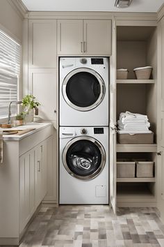 a washer and dryer in a small laundry room with open shelve