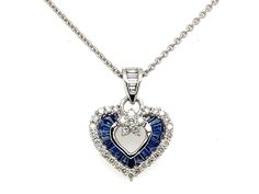 PRODUCT DESCRIPTION: 18k White Gold Dainty Heart Charm Pendant Necklace With Genuine Blue Sapphire Stones & Diamond Bale / Diamond And Sapphire Heart Charm - Solid 18k Gold: 2.78 Grams - 37 Natural Diamonds / Total Weight: .60 Carats - High Quality Diamonds: (F-G Color / VS Clarity) - Genuine Blue Sapphires: - 17 Stones / .73 Carats  - Pendant Dimensions: (15mm Height) x (16mm Width) - Chain Details: Solid 18k Gold Cable Chain With Lobster Lock (Approx 1mm Chain Width)  ------------------------- Sapphire Stones, 18k Gold Chain, Charm Pendant Necklace, Sapphire Stone, Online Jewelry Store, Quality Diamonds, Cable Chain, Heart Charm, Charm Pendant