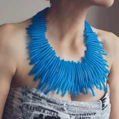 Chic statement blue necklace. You will love wearing this jewelry piece for special occasions. The necklace is possible also in magenta, black and royal blue. MATERIALS: Rubber cord MEASHUREMENTS: Bib: 24 cm x 10 cm or 9,44" x 3,9" Necklace length 60 cm or 23,6" HOW TO CARE: Keep jewelry in individual zip lock bags. Avoid mechanical impact and contact with cosmetics. If necessary, wipe the spot with napkin.  PACKAGE: All jewelry are sent in PVC storage bag with branded sticker. Don't hesitate to Bold Blue Jewelry For Party, Handmade Bold Blue Jewelry, Bold Handmade Blue Jewelry, Quirky Ring, Pvc Storage, Bib Necklaces, Blue Necklace, Keep Jewelry, Contemporary Jewelry