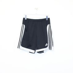 SKU - BD3440 Vintage Adidas shorts in black and white. Best fits M DETAILS: ▫️ Front logo ▫️ Drawstrings   👕 Fits like a ~ M ▫️ Label states ~  ▫️ Waist ~ 28" ▫️ Inside length ~ 7.5"  ▫️ Outside length ~ 17" Waist measurement is taken without stretching.   👇 If any defect is found and it is not included in the provided photos, it will be listed below. ▫️     🧺 All items are professionally washed and ironed before photos are taken and then sold.    ✅ If the item is listed, it is available    ❌ Short Adidas, Adidas Vintage, Adidas Shorts, Waist Measurement, Vintage Adidas, Sport Fitness, Stretching, Favorite Outfit, Vintage Items