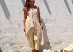 light beige organic cotton sleeveless bias cut asymmetrical long tunic top  fabric: 100% organic cotton condition: excellent,new with tags size: tag 2, fits sizes from xs to xl, shown on a small armpit to armpit: 22"-24" (bias cut) length: from 23" to 45" https://www.instagram.com/annaohsailors https://www.facebook.com/annaohsailors Beige Cotton Tunic For Spring, Chic Beige Summer Tunic, Summer Cotton Tunic With Asymmetrical Hem, Summer Beige Linen Tunic, Spring Beige Cotton Tunic, Summer Lagenlook Tunic With Asymmetrical Hem, Long Tunic Tops, Patches Fashion, Boho Top