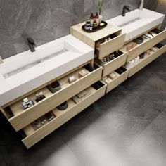 two sinks and drawers in a modern bathroom