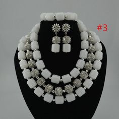 Custom-made Jewelry Set for African Wedding Party in Nigerian | Etsy White Crystal Bridal Sets For Party, White Pearl Jewelry With Silver Beads, Formal White Jewelry With Silver Beads, White Crystal Bridal Accessories For Formal Occasions, Formal White Crystal Bridal Accessories, Formal White Bridal Accessories With Crystals, Elegant White Bridal Sets For Party, White Pearl Necklace With Silver Beads For Party, Wedding Pearl Beaded Jewelry Set