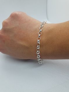 This beautiful delicated bracelet has been carefully crafted in solid 925 sterling silver. Great for any ocassion! Buy it for your-self or for someone you love . Bracelet can also be resized at no extra cost and it will be shipped to you in an elegant gift box. A tracking shipping number will be provided to you once the bracelet has been mailed. Bracelet length: 8 inches Weight: 5.1 grams Materials: 925 Solid Sterling Silver, also available in 10k Yellow Gold Lobster claw Thanks for visiting my Classic Bracelets With Lobster Clasp As Gift, Classic Bracelets With Lobster Clasp For Gifts, Round Silver Chain Bracelets As Gifts, Silver Chain Bracelets As Gift, Hallmarked Sterling Silver Link Bracelet Gift, White Gold Oval Link Bracelet As A Gift, Sterling Silver Bracelet With Lobster Clasp, Classic Link Charm Bracelet For Gift, Classic Sterling Silver Link Bracelet Gift