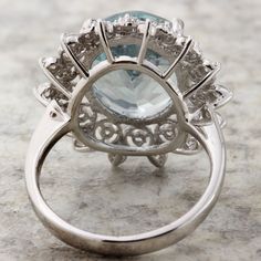 7.50 Carats NATURAL AQUAMARINE and DIAMOND 14K Solid White Gold Ring Total Natural Oval Aquamarine Weight is 6.50Ct Aquamarine Measures: 14 x 12mm Total Natural Round Diamonds Weight is: 1.00Ct (Clarity SI1 / Color G-H) Head of The Ring Measures: 21.60 x 20.60mm Item total weight is: 5.9grams Suggested Replacement Value: $4,100.00 Disclaimer: all weights, measurements and colors are approximate and may vary slightly from the listed dimensions or as seen in the image. All pictures are magnified t Luxury Round Topaz Ring With Diamonds, Luxury Round Diamond Topaz Ring, Luxury White Gold Topaz Ring With Halo Setting, Luxury White Gold Topaz Ring With Round Cut, Formal Round Rings With Accent Stones, Luxury White Gold Topaz Ring With Prong Setting, Formal Hallmarked Sapphire Ring, Luxury Halo Ring For Formal Occasions, Exquisite White Gold Topaz Ring For Formal Occasions