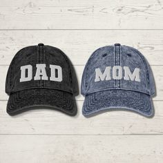 "If you're looking for a gift that's both unique and personal, look no further than the Mom & Dad Embroidered Dad Hat. This stylish cap is the perfect way to announce your pregnancy in style, and it also makes a great gift for new parents-to-be. The hat is made of high-quality materials, and features intricate varsity lettered embroidery work that reads \"Mom\" and \"Dad\". It's adjustable, so it can be worn by anyone, and its color scheme means it will go with any outfit. Whether you're looking Personalized Cotton Birthday Hat, Father's Day Baseball Cap With Letter Print, Personalized Cotton Baseball Cap As A Gift, Personalized Cotton Baseball Cap As Gift, Cotton Dad Hat With Letter Print As Gift, Adjustable Baseball Cap With Letter Print As Gift, Letter Print Baseball Cap As A Gift, Adjustable Letter Print Baseball Cap As Gift, Personalized Dad Hat Gift