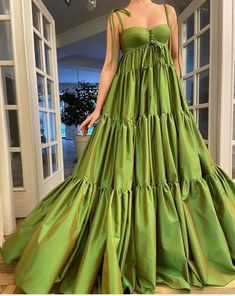 Details: -Exquisite taffeta fabric -Luscious lime green color -Higher waist definition with horizontally layered skirt -For special occasions Green Ruched Bodice Maxi Dress For Gala, Green Maxi Dress With Ruched Bodice For Gala, Green Prom Gown With Ruched Bodice, Green Gown With Ruched Bodice For Prom, Green Gown With Spaghetti Straps For Evening, Green Evening Gown With Spaghetti Straps, Green Spaghetti Straps Gown For Evening, Green Spaghetti Strap Evening Gown, Green Prom Gown With Pleated Bodice