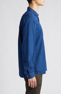 Lightly faded Japanese chambray made of cotton and linen keeps the vibe casual and relaxed in a shirt that always looks great when you leave it untucked. 28" length (size medium) Front button closure Spread collar Long sleeves with button cuffs Chest patch pocket 83% cotton, 17% linen Machine wash, dry flat Imported