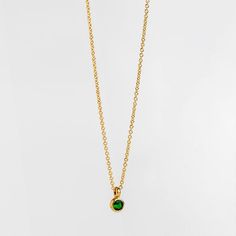 Formal Gold Emerald Necklace With Round Pendant, May Birthstone Gift Solitaire Necklace With Round Pendant, Classic Yellow Gold Emerald Necklace For May Birthstone, Dainty Gold Emerald Necklace For Formal Occasions, Green Birthstone Necklace With Delicate Chain For May, Dainty Yellow Gold Emerald Necklace For Anniversary, Minimalist Gold Emerald Necklace As Gift, Green Birthstone Necklace For May With Delicate Chain, Gold Emerald Necklace For Formal Occasions