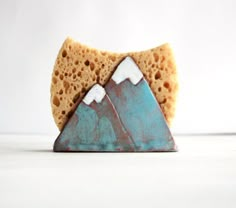 a piece of bread with mountains on it