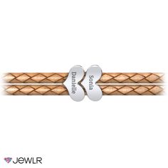 Stack your love together with our leather bracelet featuring up to five engravable sterling silver hearts. This double-wrap braided leather bracelet includes a silver clasp closure and is available in small, medium, or large for the perfect fit. Personalize yours with an engraved initial on each heart and a choice of pearl white, black, or tan leather. Silver Leather Jewelry For Anniversary, Personalized Silver Leather Jewelry, Classic Adjustable Personalized Heart Bracelet, Personalized White Adjustable Heart Bracelet, Personalized Sterling Silver Double Heart Bracelet, Elegant Personalized Silver Leather Bracelet, Anniversary Engraved Silver Leather Bracelet, Silver Engraved Leather Bracelet For Anniversary, Personalized Silver Leather Bracelet For Anniversary