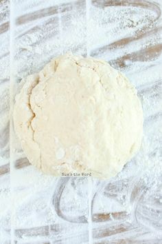 an uncooked dough is sitting on a table