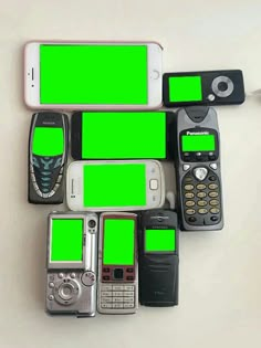 there are many cell phones with green screen on the top one is black and white