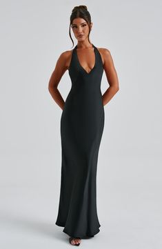 Feel like an angel in Halo, our silky soft maxi made in a luxurious satin with a light texture. With a plunge, halter neckline, this style ties at the back neck and is cut on the bias for a beautiful drape that skims over the figure. 



Colour: Black.

Premium non-stretch satin with light texture.

Fully lined.

Plunge, halter neckline.

Cut on the bias for a beautiful drape.

Ties at the back neck.

Invisible zipper fastening.

Maxi length.

 Size: XS, S, M, L, XL, XXL Backless Formal Dresses, Loungewear Dresses, Maxi Dress Sale, Gown Prom, Light Texture, Stretch Satin, Celebrity Dresses, Halter Neckline, An Angel