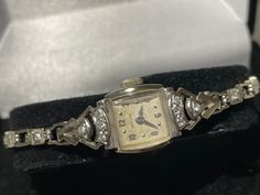 "Ladies vintage Hamilton 14 Kt white gold diamond wristwatch with matching 14 kt gold diamond band.  This beautiful combination is custom fit for a 6.5\" wrist and has a safety in the clasp as well as a safety chain. This stunning piece features 14 diamonds that are approximately 1.5mm , 8 are in the case and lugs of the watch while 6 are located in the links closest to the lugs. The watch is in good working condition and keeps accurate time. The movement is a 17 jewel model 750 and is a hand winding style that runs for 24 hours on a full wind. A lovely combination well preserved and still in its original Bakelite hinged box." White Gold Diamond Band, Antique Costume Jewelry, Sterling Silver Rings Turquoise, Gold Diamond Band, Pretty Accessories, Mabe Pearl, Turquoise Ring Silver, Safety Chain, Salisbury