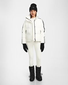 Hit the slopes in the KIMIA by RUDSAK, a women’s relaxed fit down ski jacket with a modern, boxy silhouette and bold racer stripes down the arms for a sporty chic edge. Its textured, wind and water-resistant shell offers both protection and style, while the stand-up collar adds a sleek, contemporary touch. Insulated with RDS-certified down and designed for fashion-forward skiers, this jacket combines comfort with statement-making appeal, ensuring you stay warm and on-trend during winter adventures.