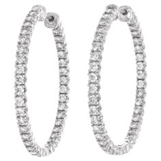 Circa 2005, 18k, by Tiffany & Co., New York. These chic diamond hoops by Tiffany & Co. are all about the diamonds! Set with 2.79 carats of brilliant white diamonds (G color VS clarity), the look is sparkling American girl glamour. At one and a half inches in diameter, they are proportioned perfectly for the ear and grab the attention of the eye tastefully. Excellent condition. Noted: Comes with an original Tiffany appraisal from 2011 Remark: "Tiffany quality, Tiffany Design …classic iconic style Tiffany And Co Earrings, Outfit Vision Board, Silver Round Earrings, Tiffany Diamond, Tiffany Earrings, Breakfast At Tiffany's, Jewelry White, Blessed Life, Authentic Jewelry