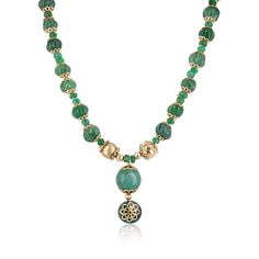 Introducing our exquisite Natural Emerald Carved Beaded Pendant Necklace. This stunning piece features a captivating array of round cabochons, rondelles, and intricately hand-carved emeralds, each meticulously crafted to create a unique and eye-catching texture. The highlight of this necklace is an earthy, breathtaking round cabochon emerald pendant, adorned with beautiful floral golden etchings, set in 14k yellow gold with silver gold plating. This pendant adds a touch of elegance and sophistic Gold Emerald Round Bead Necklaces, Gold Emerald Bead Necklaces, Emerald Necklaces With Natural Stones In Round Beads Shape, Emerald Beaded Necklaces With Natural Stones, Bohemian Gold Emerald Necklace With Round Beads, Bohemian Style Gold Emerald Necklace With Round Beads, Gold Jade Necklaces With Polished Beads, Elegant Round Spacer Beads, Artisan Gold Gemstone Beads And Cabochons