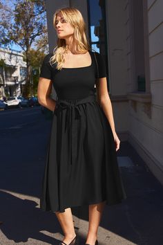 Looking for the perfect dress? The Black Square Neck Short Sleeve Midi Dress is your go-to! Its flattering neckline and comfortable short sleeves make it perfect for anyone who wants to look great without compromising on comfort! Product code: DAA05A4D004AA Features:  Knit Square neckline Short sleeve Waist tie Midi Material: 73%POLYESTER,23%RAYON,4%SPANDEX. Wedding Guest Dress Square Neck, Solid Color Square Neck Midi Dress For Day Out, Midi Dress With Square Neck For Day Out, Chic Summer Short Sleeve Dress, Fitted Short Sleeve Solid Midi Dress, Short Sleeve Fitted Midi Dress, Black Short Sleeve Midi Dress For Summer, Fitted Short Sleeve Solid Color Midi Dress, Fitted Short Sleeve Midi Dress For Day Out