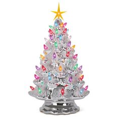 a silver christmas tree with multicolored lights and a star on top is shown in front of a white background