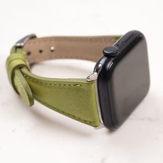 Green Leather Apple Watch Band 38mm 40mm 42mm 44mm 45mm 49mm Ultra unisex iWatch Strap Armband for Series 8 7 6 5 4 3 2 1 & SE, Fitbit Versa 4 3 2 1 SENSE 1 2 Watch Band ✽ DETAILS ✽ *Our Watch Band fits 155-200mm (6.1" - 8.0") wrists. *We can make a custom band with a different price. Please message us if you have a different wrist size. *Metal clasp/connector included 7 different color options for adapters (Silver, Gold, Rose Gold, Space Gray, Black, Blue & Red) Adapter color and buckle color w Modern Green Rectangular Apple Watch Band, Adjustable Green Apple Watch Band For Everyday Use, Adjustable Green Apple Watch Band, Green Adjustable Bracelet Strap Watch Accessories, Adjustable Green Bracelet Strap Watch Accessories, Rectangular Green Apple Watch Band As A Gift, Green Rectangular Apple Watch Band Gift, Apple Watch Aesthetic Bands, Fitbit Versa 4