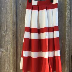 Pleated Brand New Midi Skirt. Red Flared Pleated Skirt For Summer, Red Pleated Maxi Skirt For Summer, Red Midi Pleated Skirt For Summer, Red Long Pleated Skirt For Spring, Red A-line Maxi Skirt For Spring, Red Pleated Midi Skirt For Spring, Red Lined Midi Skirt, Red Midi-length Summer Bottoms, Red Midi Lined Skirt