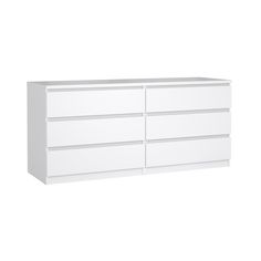 a white dresser with four drawers on it