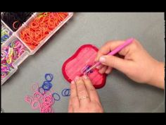 a woman is working on some crafting supplies