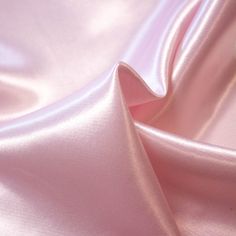 Lee is a powdered pink cupro & cotton blend fabric with elegant satin look. Its a fluid fabric ideal for tops, blouses, shirts, dresses and skirts. Composition: 60% CUPRO, 40%CO Width: 150 cm Colour: powdered pink Pattern: solid Weight: 180 gr/m2 Powder Pink Dress, Satin Blanket, Pink Satin Fabric, Pink Widget, Red Bridal Dress, Pink Satin Dress, Fashion Project, Pink Pattern, Black Aesthetic Wallpaper