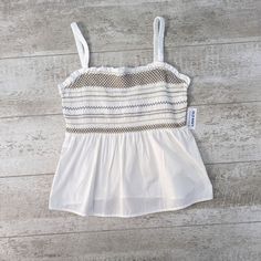 Nwt Old Navy Smocked Babydoll Tank Top White Medium 100% Cotton Sleeveless Size - Medium Color - White Material - 100% Cotton Condition - New With Tag Attached! Measurements - *Please See Pictures* Features: Babydoll Tank Top, Pullover, Sleeveless, Square Neck, Ruffle, Smocked, Stretch Aesthetic: Casual, Classic, Summer, Vacation, Travel ** All Measurements Are Approximate Summer Cotton Tank Top With Smocked Back, Beach Cotton Tank Top With Smocked Back, Summer Cotton Tank Top With Smocked Bodice, Cotton Tank Top With Smocked Back For Beach, Cotton Tank Top With Smocked Bodice For Vacation, Sleeveless Cotton Tank Top With Smocked Bodice, Beach Smocked Cami Top, Beach Cami Top With Smocked Bodice, Sleeveless Smocked Back Tank Top For Vacation