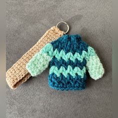 Christmas Sweater Crochet Handmade Original Keychain Turquoise **My Own Personal Creation** One Of A Kind I Hand Crocheted This Christmas Sweater Keychain Set Completely With Key Ring, Wristlet Strap And Cute Mini Crochet Sweater Attached Acrylic Yarn Wristlet Measures Approximately 4.5” Sweater Is Approximately 3” X 5” - Can Be Used As A Bag Charm Or Hang Your Keys On - One Of A Kind Design Created By Me -If You Have A Request For A Certain Color Or Design Please Feel Free To Message Me On Here Cute Mini Crochet, Crocheted Stuff, Mini Crochet, Sweater Crochet, Keychain Set, Crochet Diy, Bag Charms, Have A Wonderful Day, Diy Keychain