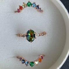 Rainbow Engagement Rings, Wedding Rings Colorful, Rainbow Rings Jewelry, Rainbow Wedding Ring, Galaxy Engagement Ring, Rainbow Sapphire Ring, Rainbow Engagement Ring, Queer Engagement Rings, Colorful Wedding Rings