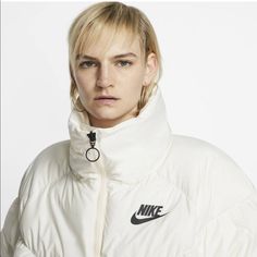 Brand New Spring Sporty Puffer Jacket For Sports, Sporty Spring Puffer Jacket For Sports, White Hooded Track Jacket For Winter, White Sportswear Track Jacket For Outdoor, White Track Jacket For Winter Sports, White Outdoor Sportswear Track Jacket, White Hooded Sports Outerwear, White Hooded Athleisure Outerwear, Nike White Hooded Track Jacket