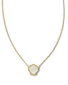 Inspired by carefree days spent collecting treasures on the beach, the Brynne Gold Shell Short Pendant Necklace in Ivory Mother-of-Pearl is too cute to miss. Featuring etched grooves for added texture, this shell-shaped pendant has signature Kendra Scott hoofprint detailing on its frame for an added textured touch. Stacked up or styled solo, this necklace will add that coastal chic aesthetic to your look. Metal 14k Yellow Gold Over Brass Material Ivory Mother-of-Pearl Closure Lobster Clasp W/ Si Hoof Print, Short Pendant Necklace, Preppy Jewelry, Kendra Scott Necklace, Bar Jewelry, Chic Aesthetic, Jewelry Accessories Ideas, Seashell Necklace, Coastal Chic