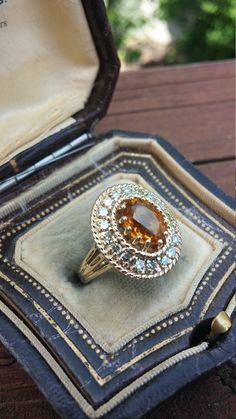 Stunning Vintage Wedding Engagement Cocktail ring, made from 14k Yellow Gold, Gorgeous Citrine and Rose Cut Diamonds... Weight is 6.6 Grams Size is 7, Sizable. Rose cut Diamonds. Layaway plan is available Formal Pear-shaped Citrine Ring, Formal Citrine Topaz Ring With Halo Setting, Yellow Topaz Ring With Halo Setting For Wedding, Heirloom Citrine Jewelry With Center Stone, 14k Gold Hallmarked Topaz Wedding Ring, 14k Gold Hallmarked Topaz Ring For Wedding, Wedding Topaz Ring In Yellow Gold With Citrine, Yellow Gold Topaz Ring Hallmarked, Yellow Gold Citrine Topaz Ring For Wedding