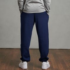 All day comfort is what you get with these classic athletic sweatpants. Made with medium-weight fleece, featuring Dri-Power® moisture wicking technology to keep body heat in so you can stay warm and dry. Elastic waistband with inside quick cord, for an adjustable fit. Hemmed elastic bottom that stays securely in place. Generous side pockets to carry your accessories with you on the go.Details: Inseams- S-30", M-31", L-32", XL-33", XXL-34", 3XL-35, 4XL-36" Dri-Power® Moisture Wicking Technology E Navy Sportswear Sweatpants With Pockets, Navy Sporty Sweatpants With Elastic Waistband, Sporty Navy Sweatpants With Elastic Waistband, Navy Sweatpants With Pockets For Sportswear, Navy Relaxed Fit Joggers For Streetwear, Navy Relaxed Fit Sweatpants For Sports, Navy Joggers With Elastic Waistband For Jogging, Relaxed Fit Sports Bottoms With Ribbed Cuffs, Navy Relaxed Fit Bottoms For Sports