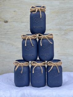 blue mason jars tied with twine and labeled mason